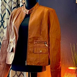 Brown faux leather bomber jacket.
